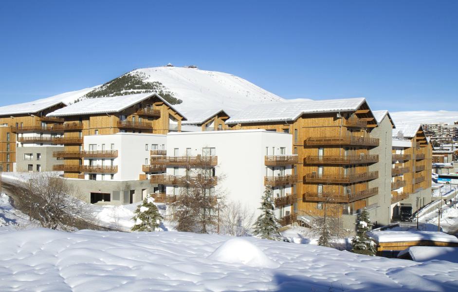 Аренда на лыжном курорте Appart'Hôtel Prestige Odalys L'Eclose - Alpe d'Huez - зимой под открытым небом