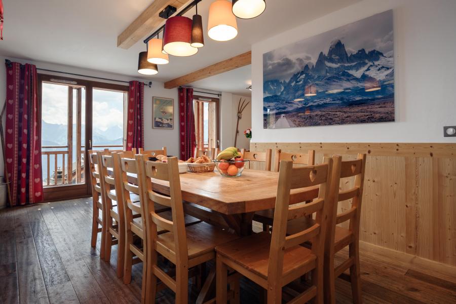 Rent in ski resort Chalet Grande Étoile - Alpe d'Huez - Dining area