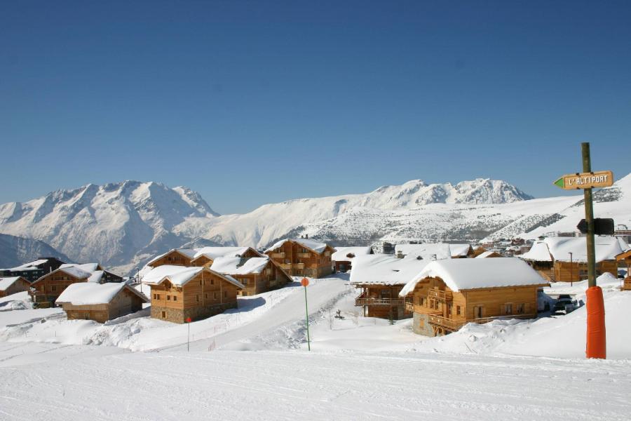 Location au ski Les Chalets de l'Altiport - Alpe d'Huez - Extérieur hiver