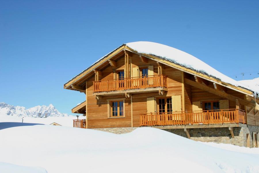 Аренда на лыжном курорте Les Chalets de l'Altiport - Alpe d'Huez - зимой под открытым небом