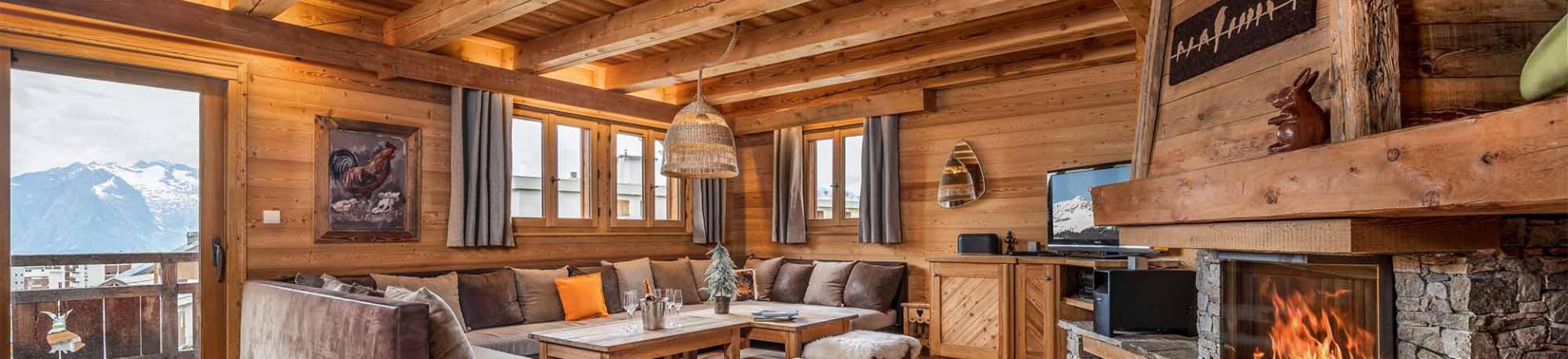 Rent in ski resort Chalet Lièvre Blanc - Alpe d'Huez - Fireplace