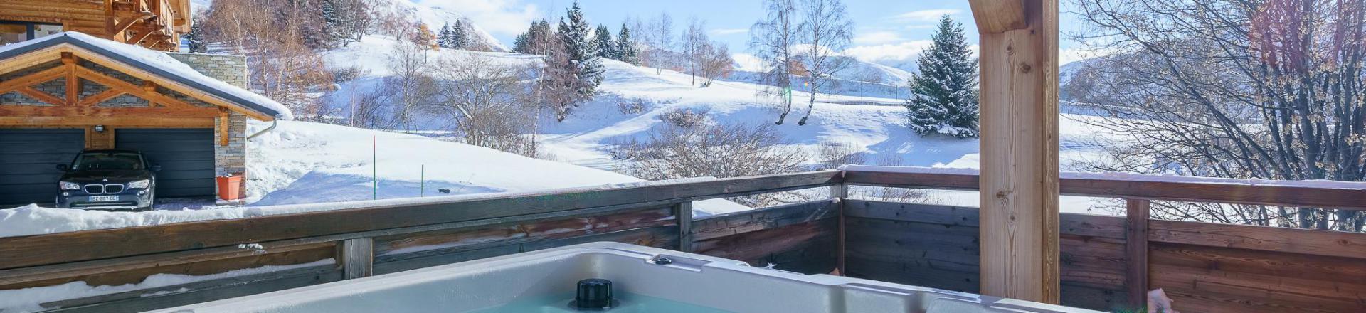 Rent in ski resort 5 room triplex chalet 8 people (Rébèque) - Chalets Les Balcons du Golf - Alpe d'Huez - Winter outside