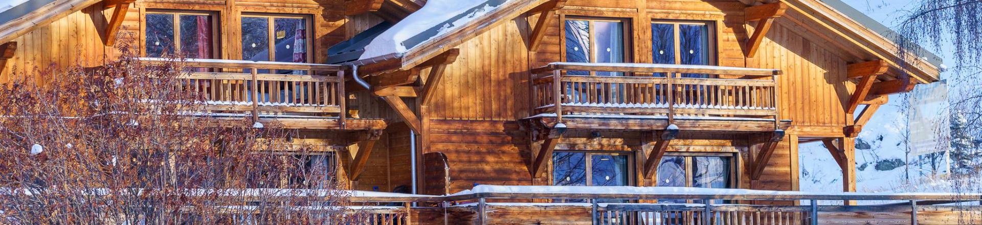 Rent in ski resort 5 room triplex chalet 8 people (Friandise) - Chalets Les Balcons du Golf - Alpe d'Huez - Winter outside