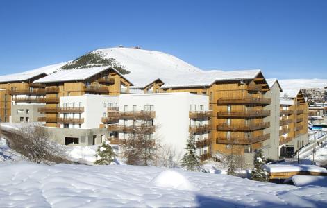 Каникулы в горах Appart'Hôtel Prestige Odalys L'Eclose - Alpe d'Huez - зимой под открытым небом