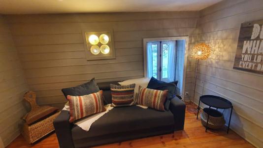 Ski verhuur Chalet le Vieux Logis - Alpe d'Huez - Sofa