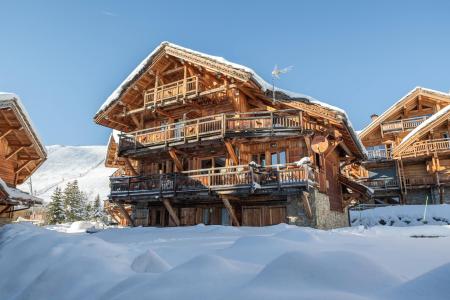 Rent in ski resort 8 room chalet 15 people - Le Chalet Loup - Alpe d'Huez - Winter outside