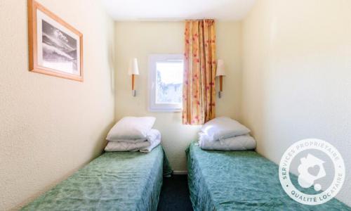 Location au ski Appartement 2 pièces 4 personnes (Confort 24m²) - Résidence les Horizons d'Huez - Maeva Home - Alpe d'Huez - Extérieur hiver