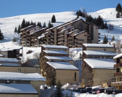 Ski verhuur Résidence les Chardons - Auris en Oisans - Buiten winter