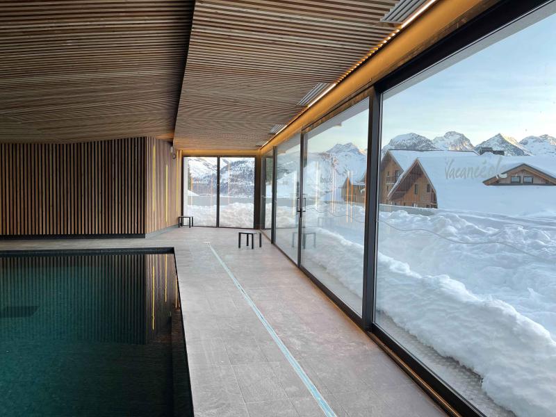 Rent in ski resort Résidence Les Ecrins d'Auris - Auris en Oisans - Swimming pool