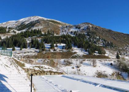 Vakantie in de bergen Résidence Iris - Auris en Oisans - Buiten winter