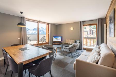Rent in ski resort Résidence Les Ecrins d'Auris - Auris en Oisans - Living room