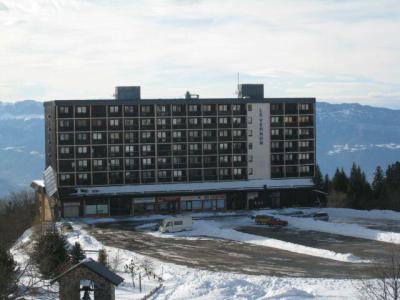 Ski verhuur Résidence le Vernon - Chamrousse - Buiten winter