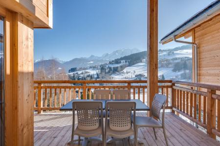 Skiverleih Doppelchalethälfte 5 Zimmer für 10 Personen (triplex) - Résidence les Fermes du Mont Blanc - Combloux - Balkon