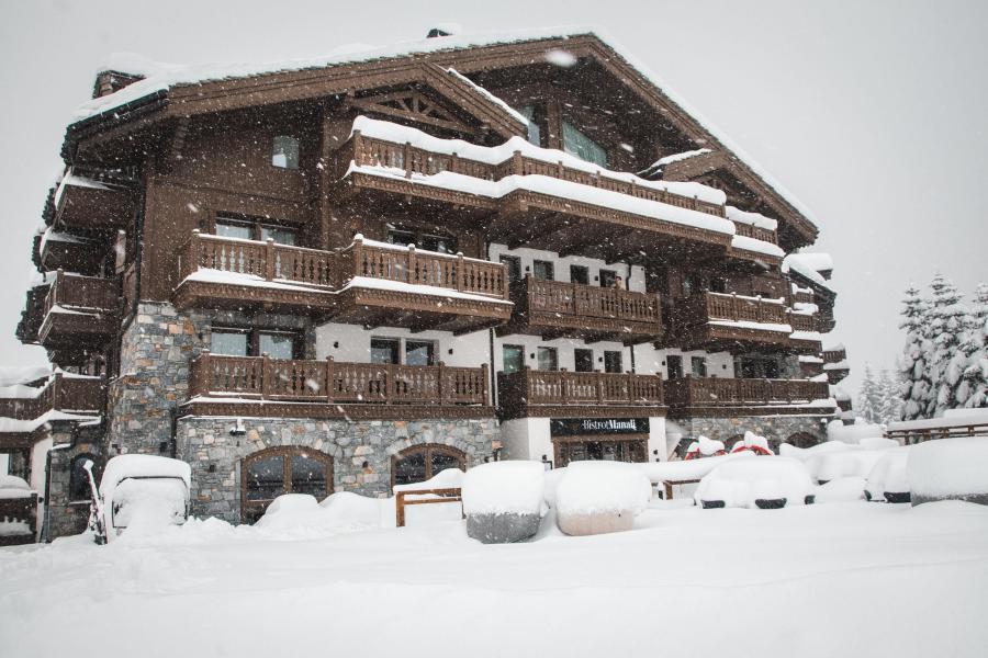 Holiday in mountain resort Manali Lodge - Courchevel - Winter outside