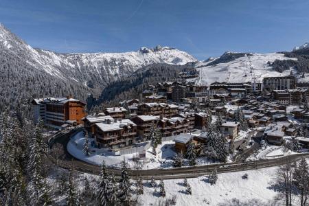 Urlaub in den Bergen Doppelchalethälfte 5 Zimmer für 8 Personen - Chalet Grande Casse - Courchevel - Draußen im Winter