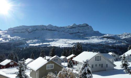 Rent in ski resort 5 room chalet 8 people (Sélection 110m²) - Les Chalets de Flaine Hameau - Maeva Home - Flaine - Winter outside