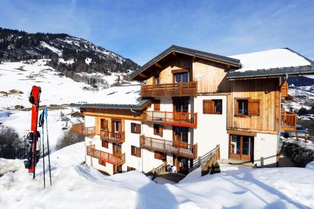 Vacances en montagne Résidence les Chalets des Evettes - Flumet - Extérieur hiver