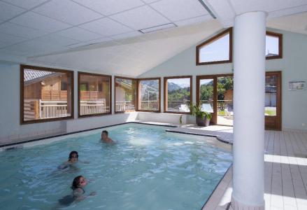 Location au ski Résidence les Chalets des Evettes - Flumet - Piscine