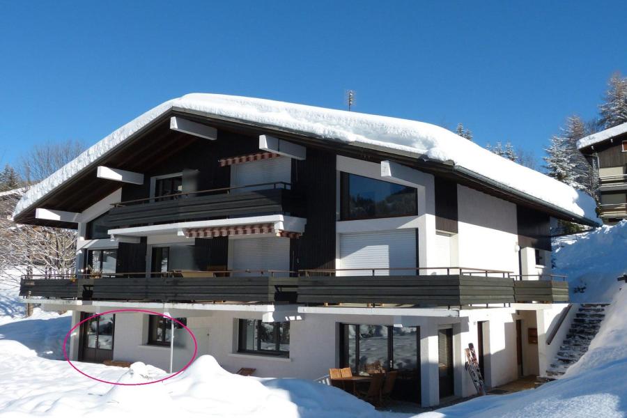 Location au ski Appartement 3 pièces 4 personnes (01) - Résidence Mérisiers - La Clusaz - Extérieur hiver