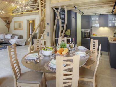 Location au ski Chalet Hélios Lodge - La Clusaz - Coin repas
