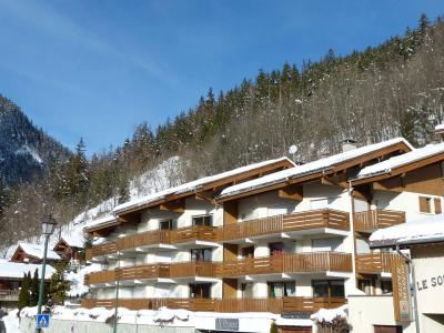 Skiverleih Résidence Crystal - La Clusaz - Draußen im Winter