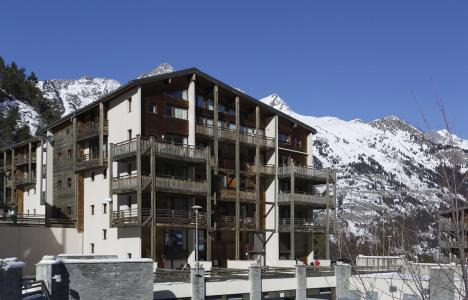 Ski verhuur Résidence les Chalets et Balcons de la Vanoise - La Norma - Buiten winter