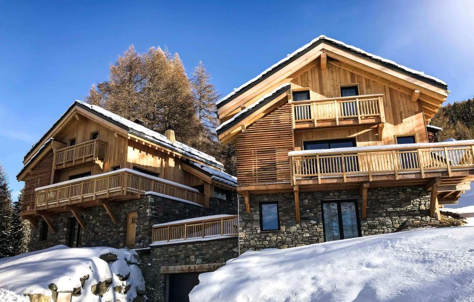 Urlaub in den Bergen Chalet Natural Lodge - La Plagne - Draußen im Winter