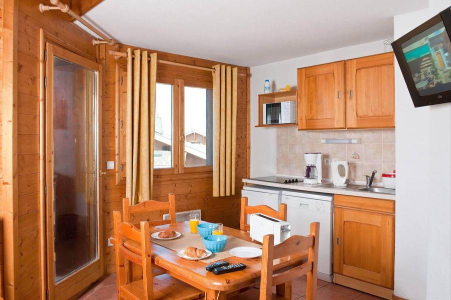 Rent in ski resort Les Lodges des Alpages - La Plagne - Dining area