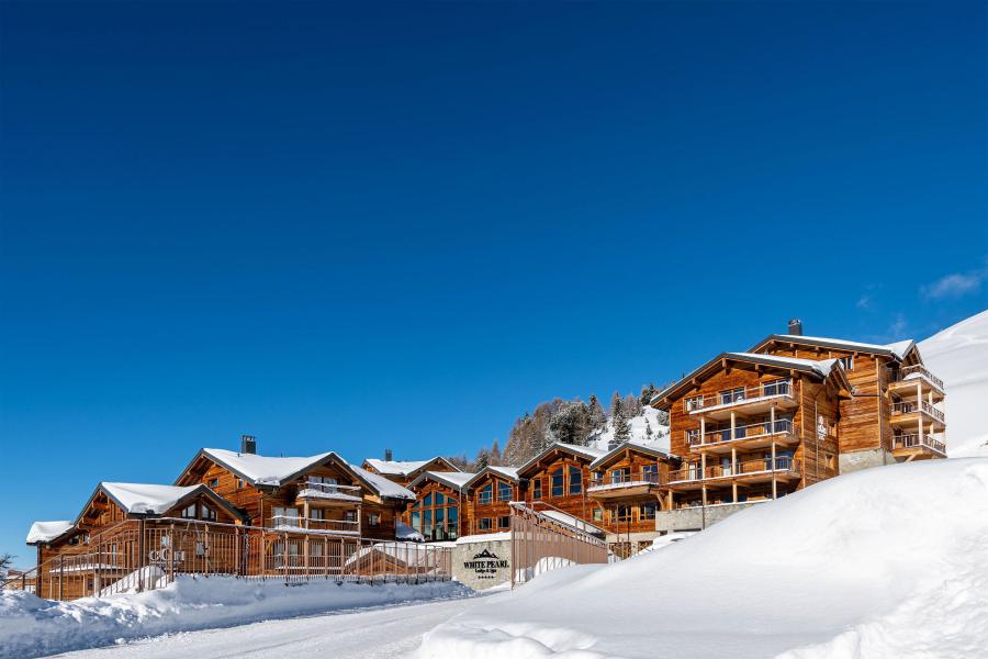 Vacances en montagne Résidence le White Pearl Lodge et Spa - La Plagne - Extérieur hiver