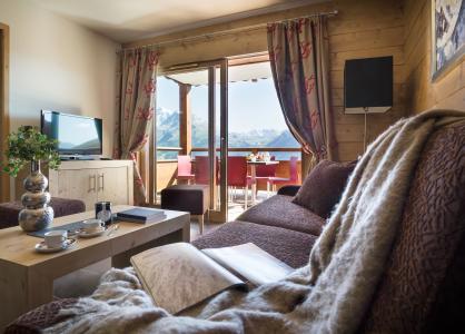 Skiverleih Résidence Boutique Le Lodge Hemera - La Rosière - Wohnzimmer