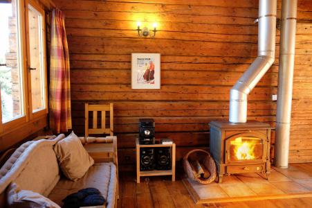 Rent in ski resort Chalet Elliot Ouest - La Tania - Fireplace