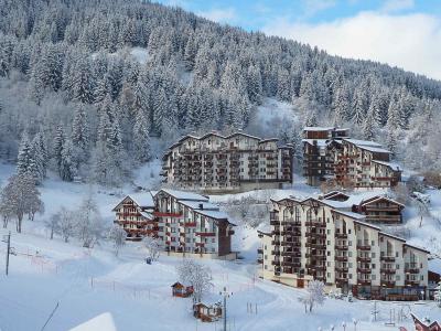 Vacances en montagne Appartement duplex 4 pièces 9 personnes (210) - Résidence Kalinka - La Tania - Extérieur hiver