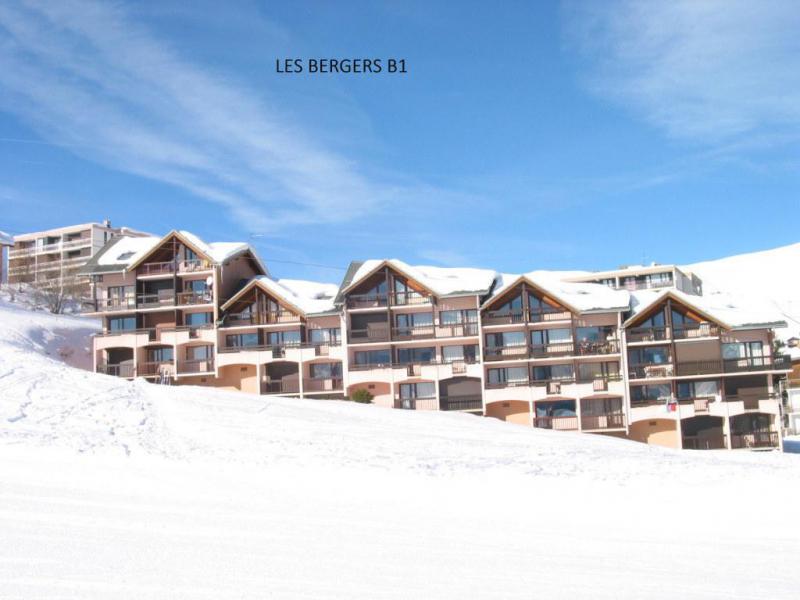 Vakantie in de bergen Résidence les Bergers - La Toussuire - Buiten winter
