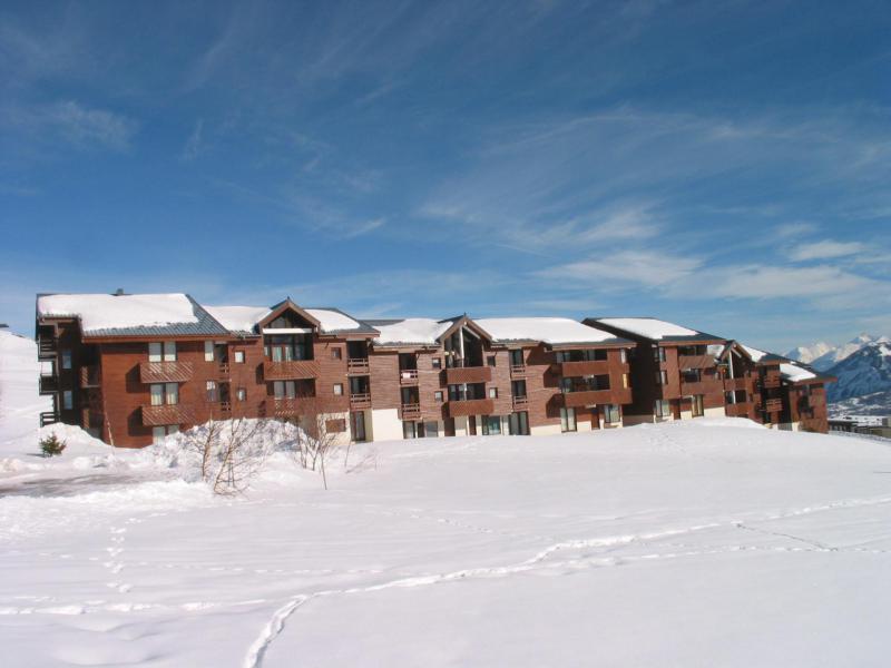 Vacances en montagne Résidence les Mousquetons - La Toussuire - Extérieur hiver