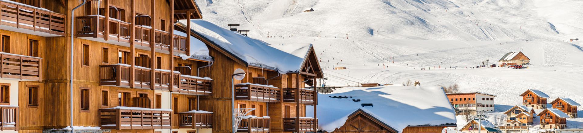 Rent in ski resort Résidence Lagrange les Hauts de Comborcière - La Toussuire - Winter outside