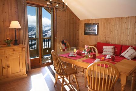 Ski verhuur Résidence les Chalets des Cimes - La Toussuire - Woonkamer