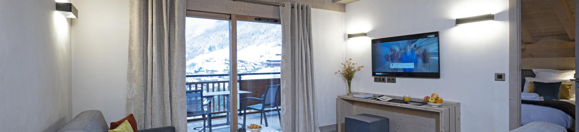 Ski verhuur Appartement 4 kamers 8 personen - Résidence les Chalets de Joy - Le Grand Bornand - Woonkamer