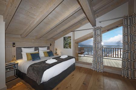 Rent in ski resort 4 room duplex apartment 8 people - Résidence les Chalets de Joy - Le Grand Bornand - Bedroom under mansard