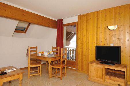 Rent in ski resort Résidences Goelia les Balcons du Soleil - Les 2 Alpes - Dining area