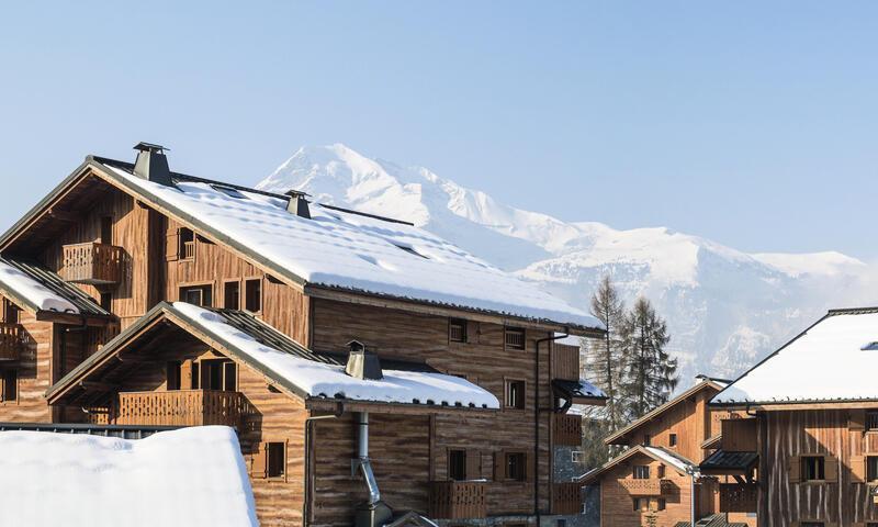 Ski verhuur Résidence les Fermes du Soleil - Maeva Home - Les Carroz - Buiten winter