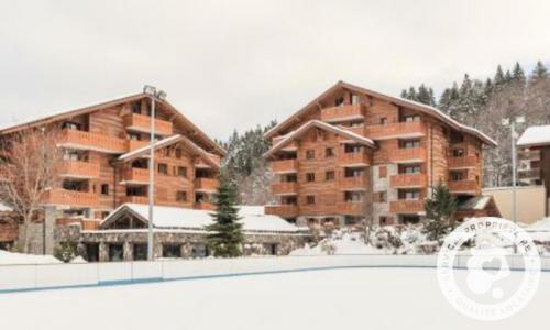 Ski verhuur Appartement 3 kamers 6 personen (Sélection 40m²-2) - Résidence les Fermes du Soleil - Maeva Home - Les Carroz - Buiten winter
