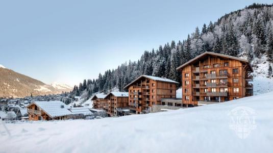 Location au ski Résidence Les Chalets Láska - Les Contamines-Montjoie - Extérieur hiver