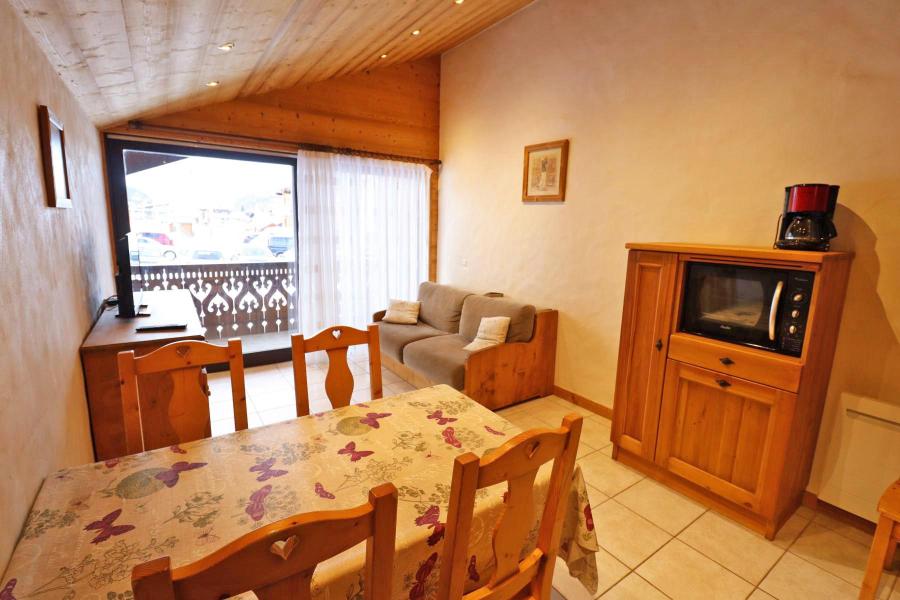 Ski verhuur Appartement 3 kamers 6 personen - Résidence Bivouac - Les Gets - Woonkamer