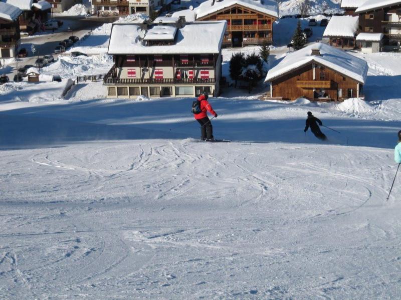 Skiverleih 4-Zimmer-Holzhütte für 9 Personen - Résidence Caribou - Les Gets - Draußen im Winter