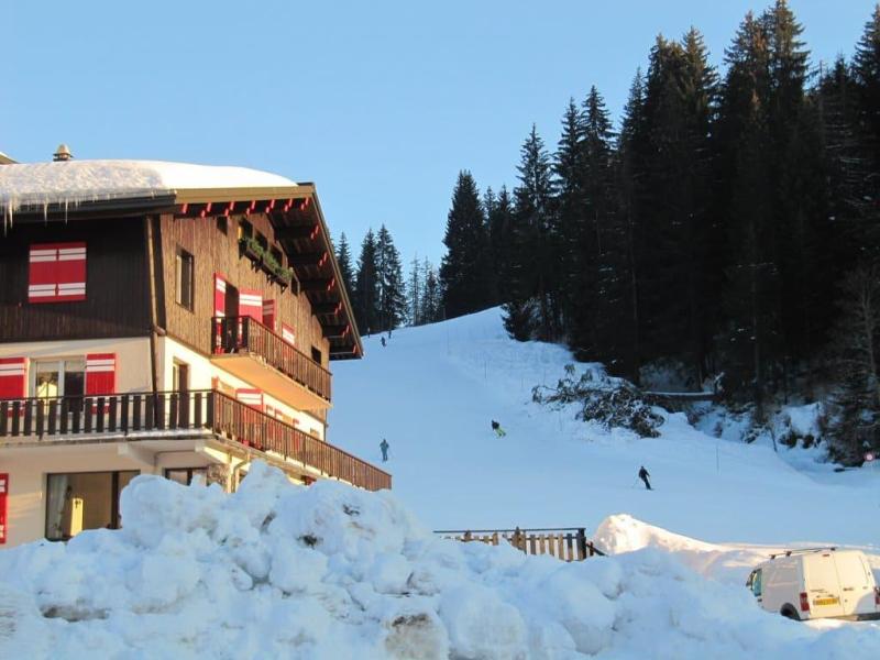 Skiverleih 4-Zimmer-Holzhütte für 9 Personen - Résidence Caribou - Les Gets - Draußen im Winter