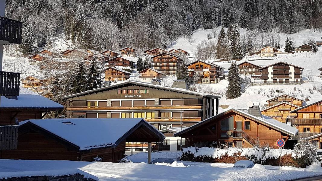 Аренда на лыжном курорте Апартаменты 3 комнат 6 чел. (65) - Résidence le BY - Les Gets - зимой под открытым небом