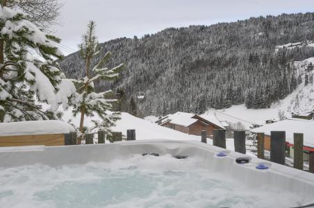 Ski verhuur Chalet 5 kamers 8 personen - Chalet Cocoon - Les Gets - Jacuzzi