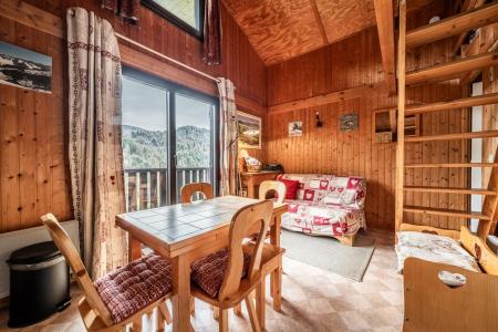 Rent in ski resort Semi-detached 2 room chalet 6 people - Chalet Moudon - Les Gets - Living room