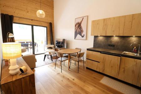 Rent in ski resort 2 room apartment sleeping corner 4 people - Résidence Cairn Harmony  - Les Gets - Living room