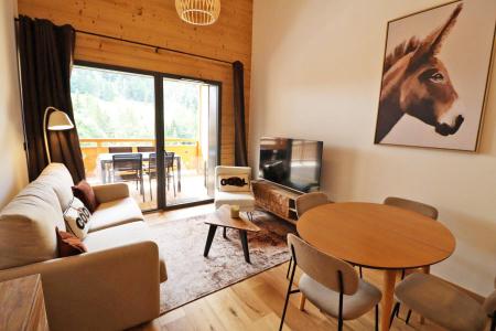 Rent in ski resort 2 room apartment sleeping corner 4 people - Résidence Cairn Harmony  - Les Gets - Living room